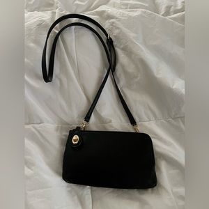 NWOT Black faux leather crossbody 
good quality with reasonable value